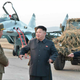 Image for article titled N. Korea's Dear Leader Gives MiG-29 Pilots Guidance On How To Fight